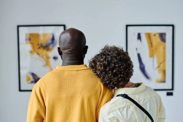 A couple viewing art in a gallery